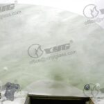 LH FRONT DOOR GLASS GREEN